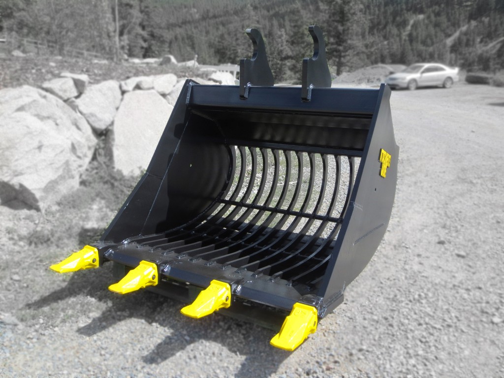 Skelton bucket for excavator. Painted black with yellow pin on teeth