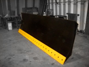 Heavy duty wheel loader snow blade / snow plow / hydraulic angle blade. Manufactured by Tysea mfg inc. Optional bolt on serrated or smooth bolt on cutting edge.