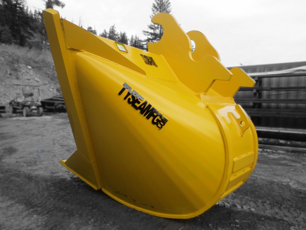 Yellow excavator v bucket with smooth bolt on cutting edge