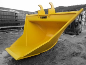 Excavator trenching bucket, painted yellow with smooth bottom edge