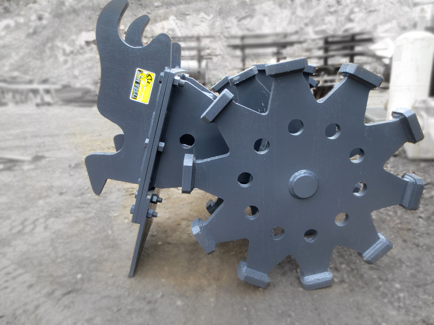 Excavator compaction wheel or sheepsfoot attachments