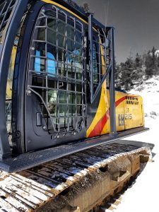 Excavator FOPS with door guard installed in addition to front and rear guards. Custom catwalks installed