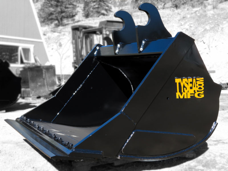 Excavator Clean up bucket, manufactured by Tysea Mfg Inc.  Drilled for bolt on cutting edge.  Ideal for cleaning and digging applications.