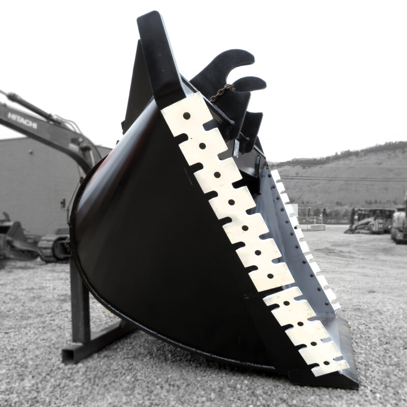 Black excavator trenching bucket with white serrated side edges and smooth bottom edge