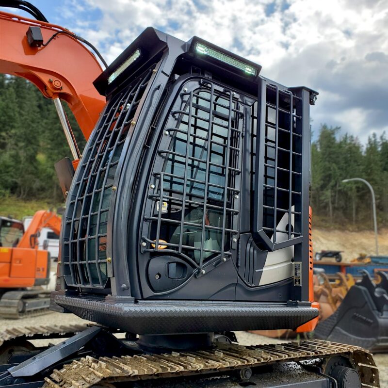 Hitachi excavator with FOPS and door guards installed