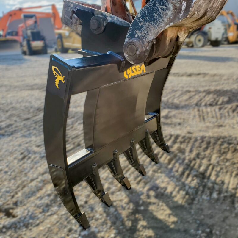 Excavator brush rake with 6 tines installed onto a Hitachi 120 series