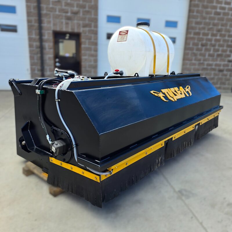 Wheel loader pickup broom with dust control system installed