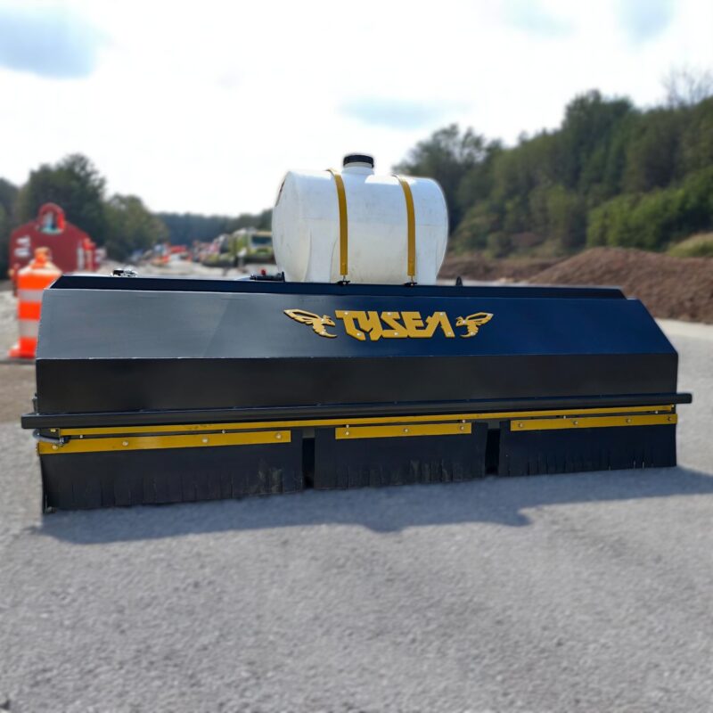 Wheel loader pickup broom with dust control on road building site