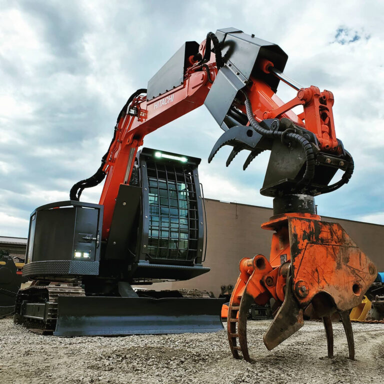 Excavator for logging with full machine body and cab guards installed for extra protection