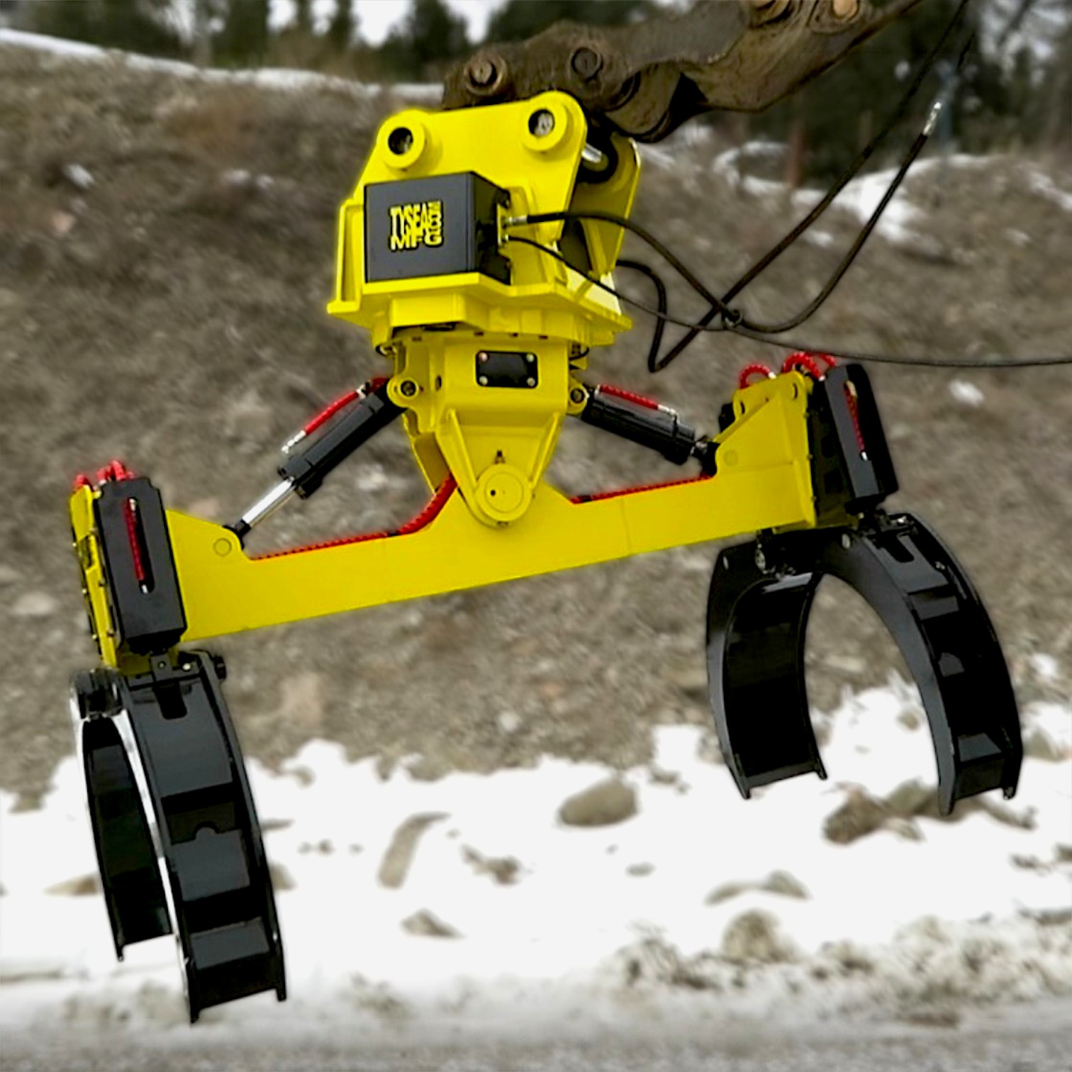 EXCAVATOR-PIPE-GRAB-ATTACHMENT Hydraulic pipe handler attachment mounted on an excavator