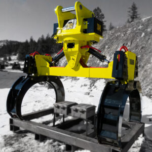 Excavator pipe handling attachment installed on pallet to be shipped to Africa