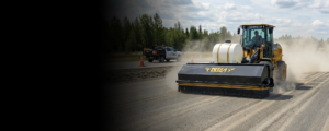 Wheel loader with pickup broom installed sweeping highway