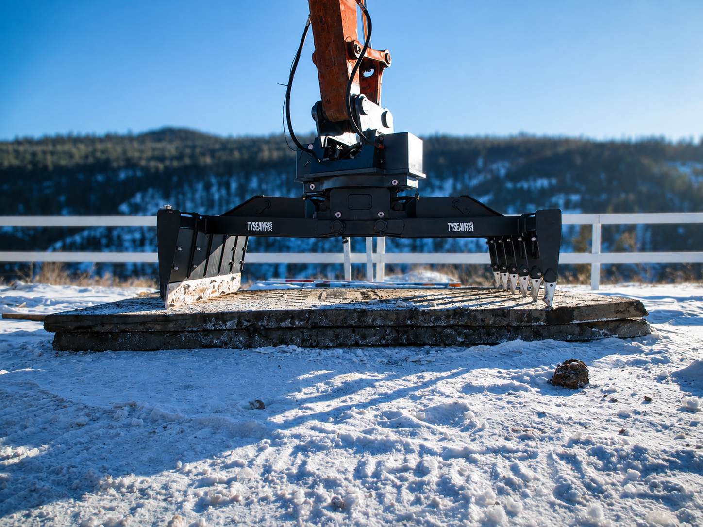 Excavator mat grappling attachment on poly rubber access mat