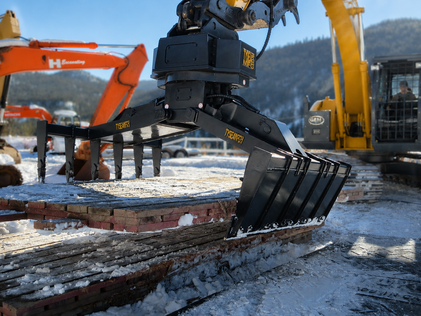 John deere excavator with mat grapple attachment moving wood rig mat