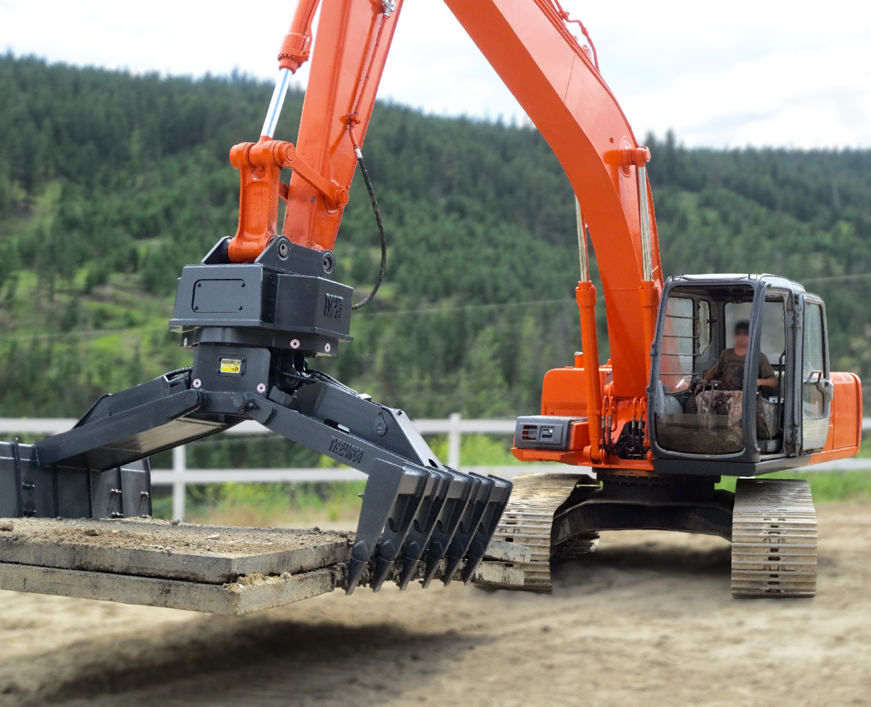 Hitachi excavator with mat handling attachment moving poly rubber matting