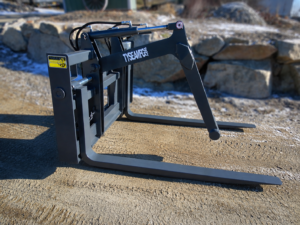 Skid Steer mat grapple painted grey side view