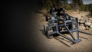 New Holland skid steer with mat grapple attachment