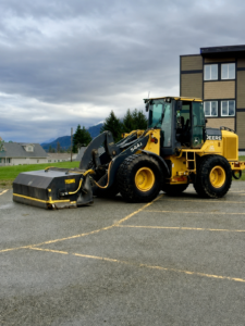 Wheel loader pickup broom installed on 544J John Deere Loader