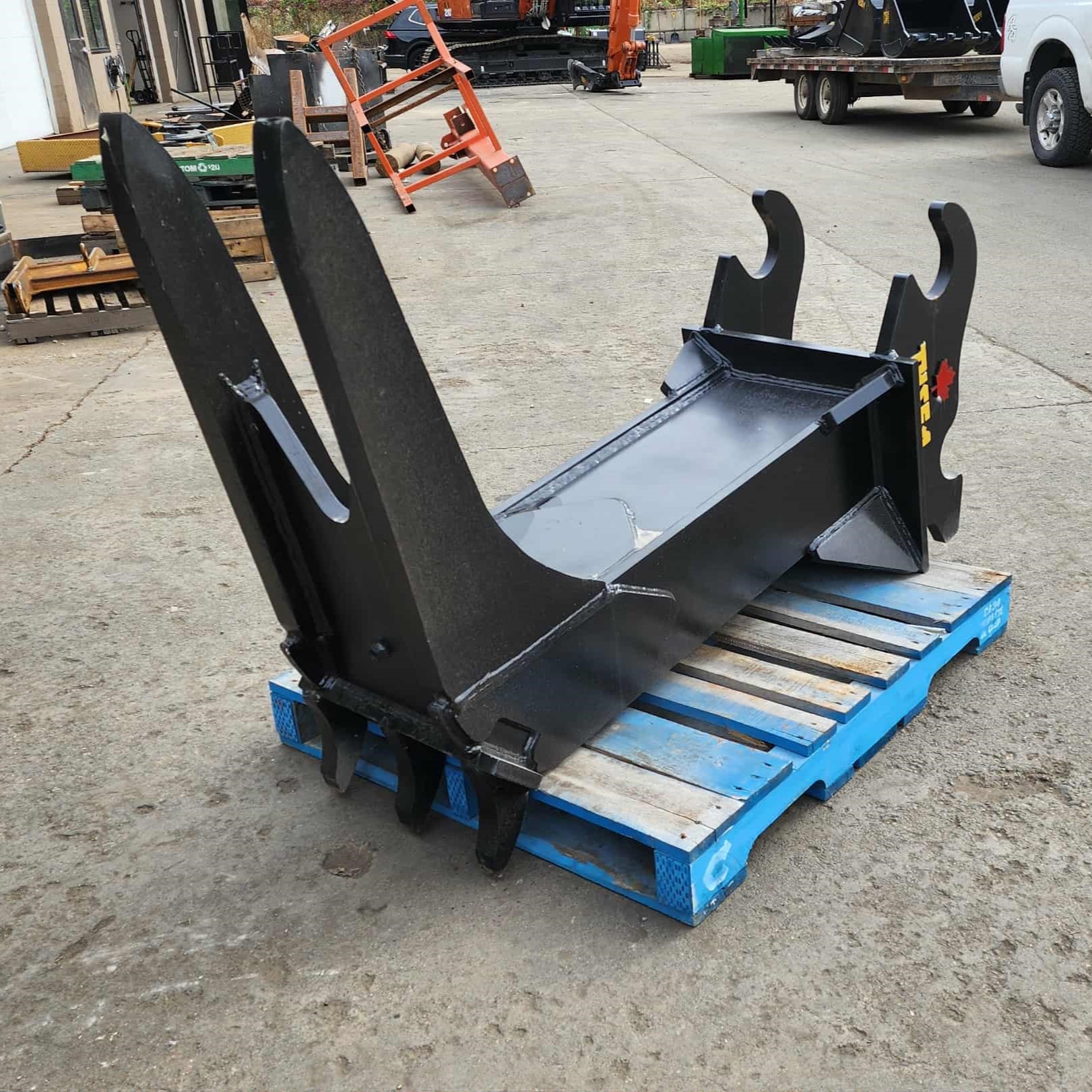 Excavator stump puller attachment